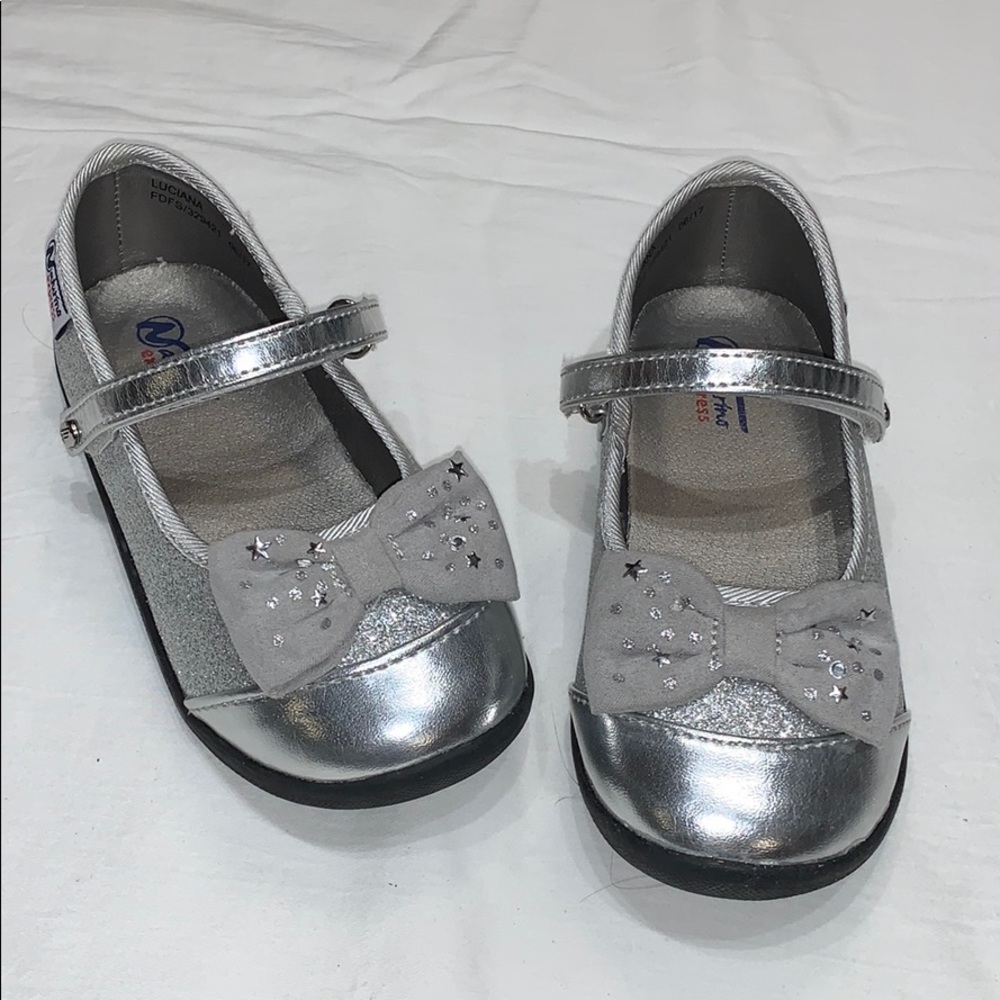 Girls silver Naturino shoes .
